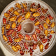 Drying colorful cherry tomatoes in a dehydrator for healthy snacks during summer Drying colorful cherry tomatoes in a dehydrator for healthy snacks during summer - PhotoDune Item for Sale