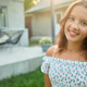 Girl standing in garden during golden hour light with sun shining behind her and home in background Girl standing in garden during golden hour light with sun shining behind her and home in background - PhotoDune Item for Sale