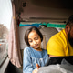 Little girl video call using tablet while traveling on a bus. Little girl video call using tablet while traveling on a bus. - PhotoDune Item for Sale