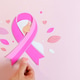 Breast cancer awareness concept with pink ribbon symbol supporting women health and prevention Breast cancer awareness concept with pink ribbon symbol supporting women health and prevention - PhotoDune Item for Sale