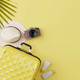 Summer travel accessories flat lay on yellow background Summer travel accessories flat lay on yellow background - PhotoDune Item for Sale