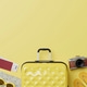 Summer travel accessories flat lay on yellow background Summer travel accessories flat lay on yellow background - PhotoDune Item for Sale