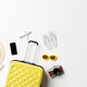 Travel accessories with suitcase on minimal white background Travel accessories with suitcase on minimal white background - PhotoDune Item for Sale