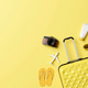 Summer travel accessories flat lay on yellow background Summer travel accessories flat lay on yellow background - PhotoDune Item for Sale