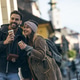 Hugged Tourist Couple Drinking Coffee Hugged Tourist Couple Drinking Coffee - PhotoDune Item for Sale
