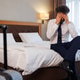 Stressed businessman covering face after laptop problem in hotel room Stressed businessman covering face after laptop problem in hotel room - PhotoDune Item for Sale