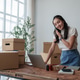 Young woman discussing online sales on mobile phone Young woman discussing online sales on mobile phone - PhotoDune Item for Sale