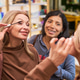 Middle Aged Woman Testing Mascara with Hispanic Girl in Beauty Store Middle Aged Woman Testing Mascara with Hispanic Girl in Beauty Store - PhotoDune Item for Sale