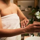 Woman Applying Body Cream during Daily Skincare Routine Woman Applying Body Cream during Daily Skincare Routine - PhotoDune Item for Sale