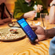 Black Man Making Mobile Payment While Dining with Friends Black Man Making Mobile Payment While Dining with Friends - PhotoDune Item for Sale