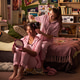 Teenage Girls Styling Hair during Sleepover Bonding at Home Teenage Girls Styling Hair during Sleepover Bonding at Home - PhotoDune Item for Sale