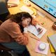 Teenage Girl Using Smartphone While Studying at Home Teenage Girl Using Smartphone While Studying at Home - PhotoDune Item for Sale