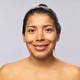 Portrait of Hispanic Adult Woman Smiling for Skincare Campaign Portrait of Hispanic Adult Woman Smiling for Skincare Campaign - PhotoDune Item for Sale