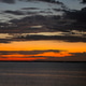 Sunset sky clouds in the Evening with Golden orange sunlight in golden hour, Dusk sky background Sunset sky clouds in the Evening with Golden orange sunlight in golden hour, Dusk sky background - PhotoDune Item for Sale