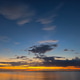 Sunset sky clouds in the Evening with Golden orange sunlight in golden hour, Dusk sky background Sunset sky clouds in the Evening with Golden orange sunlight in golden hour, Dusk sky background - PhotoDune Item for Sale
