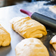 Baker Folding Sourdough Dough by Hand on Stainless Steel Baker Folding Sourdough Dough by Hand on Stainless Steel - PhotoDune Item for Sale