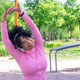 Woman stretching in park listening to music enjoying healthy lifestyle Woman stretching in park listening to music enjoying healthy lifestyle - PhotoDune Item for Sale