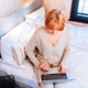 Mature Woman Working Remotely During Working vacation In Cozy Loft Cabin Mature Woman Working Remotely During Working vacation In Cozy Loft Cabin - PhotoDune Item for Sale