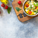 Baked egg omelette with spinach, cherry tomato and feta cheese on a stone surface. Healthy vegetaria Baked egg omelette with spinach, cherry tomato and feta cheese on a stone surface. Healthy vegetaria - PhotoDune Item for Sale