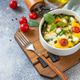 Baked egg omelette with spinach, cherry tomato and feta cheese on a stone surface. Healthy vegetaria Baked egg omelette with spinach, cherry tomato and feta cheese on a stone surface. Healthy vegetaria - PhotoDune Item for Sale