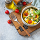 Baked egg omelette with spinach, cherry tomato and feta cheese on a stone surface. Healthy vegetaria Baked egg omelette with spinach, cherry tomato and feta cheese on a stone surface. Healthy vegetaria - PhotoDune Item for Sale