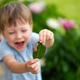 Happy little boy holding green leaf with garden snail during outdoor nature exploration. Child curio Happy little boy holding green leaf with garden snail during outdoor nature exploration. Child curio - PhotoDune Item for Sale