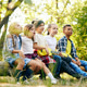 Happy children sitting on log in forest on sunny day, playing guitar, having fun. Going hiking, walk Happy children sitting on log in forest on sunny day, playing guitar, having fun. Going hiking, walk - PhotoDune Item for Sale
