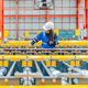 Young female engineer inspecting metal sheet roll forming production line with tablet in factory Young female engineer inspecting metal sheet roll forming production line with tablet in factory - PhotoDune Item for Sale