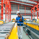 Young female engineer inspecting metal sheet roll forming production line with tablet in factory Young female engineer inspecting metal sheet roll forming production line with tablet in factory - PhotoDune Item for Sale