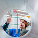 Young female engineer inspecting metal sheet roll forming production line with tablet in factory Young female engineer inspecting metal sheet roll forming production line with tablet in factory - PhotoDune Item for Sale
