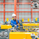 Young female engineer inspecting metal sheet roll forming production line with tablet in factory Young female engineer inspecting metal sheet roll forming production line with tablet in factory - PhotoDune Item for Sale