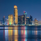 Abu Dhabi skyline at night with illuminated towers and colorful reflections Abu Dhabi skyline at night with illuminated towers and colorful reflections - PhotoDune Item for Sale
