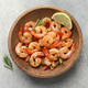 Tasty grilled shrimps with spices in bowl on grey table, top view Tasty grilled shrimps with spices in bowl on grey table, top view - PhotoDune Item for Sale