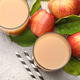 Glasses of fresh apple juice and fruits on grey table, flat lay Glasses of fresh apple juice and fruits on grey table, flat lay - PhotoDune Item for Sale