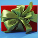 Red gift box with satin bow on blue background Red gift box with satin bow on blue background - PhotoDune Item for Sale