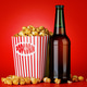 Beer and popcorn in paper bucket Beer and popcorn in paper bucket - PhotoDune Item for Sale