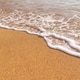 Sunny beach in Hawaii with golden sand, clear water under a bright sky Sunny beach in Hawaii with golden sand, clear water under a bright sky - PhotoDune Item for Sale