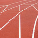 Red running track in stadium. Red running track in stadium. - PhotoDune Item for Sale