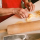 Senior Caucasian woman hands preparing homemade dough with rolling pin in bright kitchen bakery Senior Caucasian woman hands preparing homemade dough with rolling pin in bright kitchen bakery - PhotoDune Item for Sale