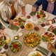 Top view of Generation family having lunch at dining table Top view of Generation family having lunch at dining table - PhotoDune Item for Sale