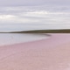 Pink salt lake of Kalmykia under a cloudy sky Pink salt lake of Kalmykia under a cloudy sky - PhotoDune Item for Sale