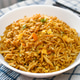 Egg fried rice in a white bowl. Egg fried rice in a white bowl. - PhotoDune Item for Sale