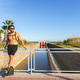 Latino man rollerblading enjoying summer leisure by beach Latino man rollerblading enjoying summer leisure by beach - PhotoDune Item for Sale