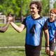 Soccer player greeting teammate on artificial grass turf field match. Smiling football men showing s Soccer player greeting teammate on artificial grass turf field match. Smiling football men showing s - PhotoDune Item for Sale