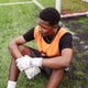 Sad soccer goalkeeper sitting on the field after a defeat. Disappointment, sports pressure, and chal Sad soccer goalkeeper sitting on the field after a defeat. Disappointment, sports pressure, and chal - PhotoDune Item for Sale