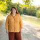 A full length front view portrait of a calm young Caucasian woman with red hair and glasses standing A full length front view portrait of a calm young Caucasian woman with red hair and glasses standing - PhotoDune Item for Sale