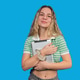 Young woman smiling, holding digital tablet, looking at camera Young woman smiling, holding digital tablet, looking at camera - PhotoDune Item for Sale
