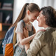 Happy Mother and Daughter Hugging Before School in Cozy Home Interior Happy Mother and Daughter Hugging Before School in Cozy Home Interior - PhotoDune Item for Sale