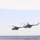 Military Helicopters Flying Over Ocean, Military Helicopters Flying Over Ocean, - PhotoDune Item for Sale