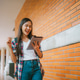 Cheerful Female Student With tablet Standing Outdoors, Happy Young Asian Woman Walking In City After Cheerful Female Student With tablet Standing Outdoors, Happy Young Asian Woman Walking In City After - PhotoDune Item for Sale